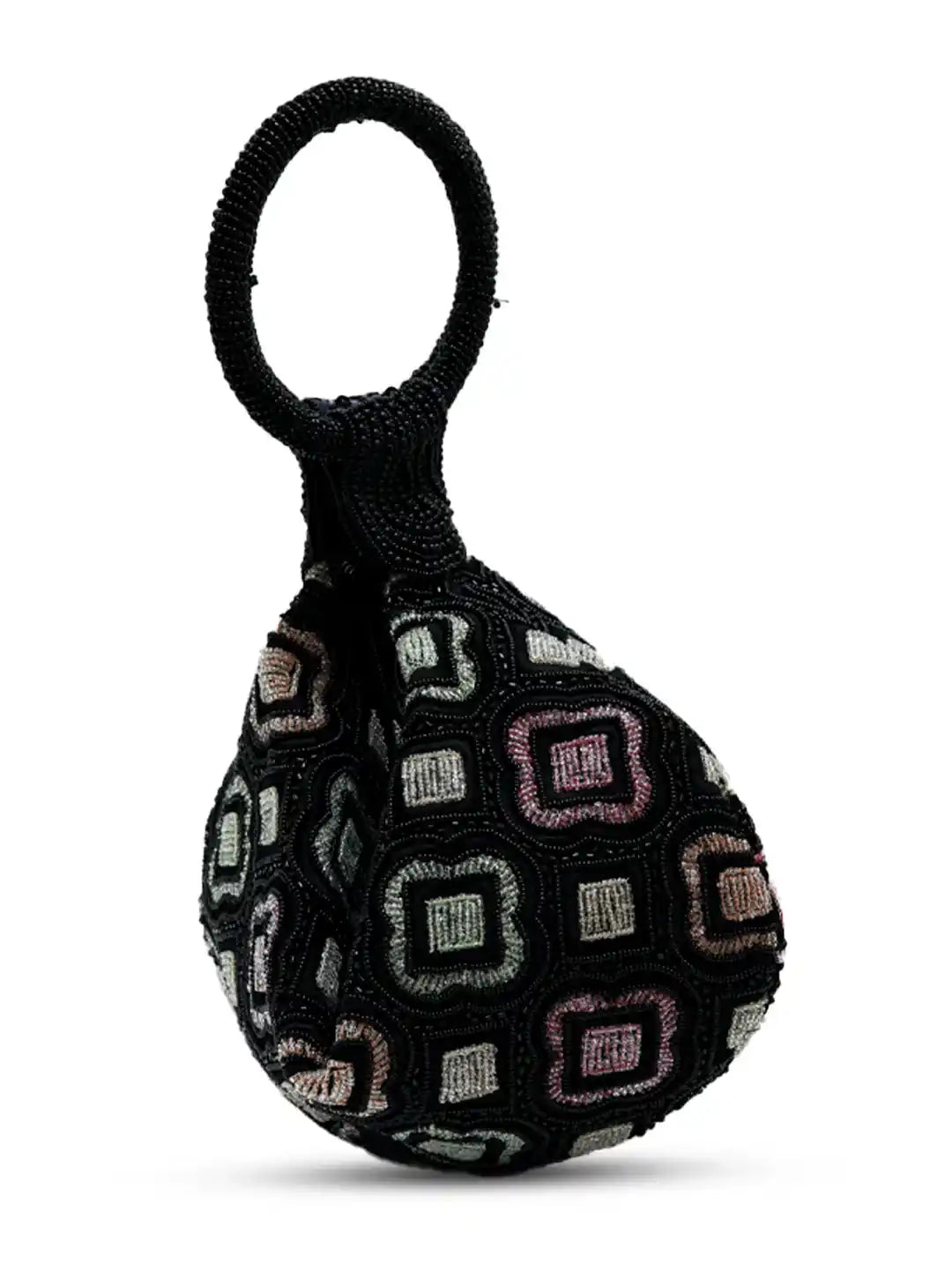 Textured black ball with patterned surface on a white background