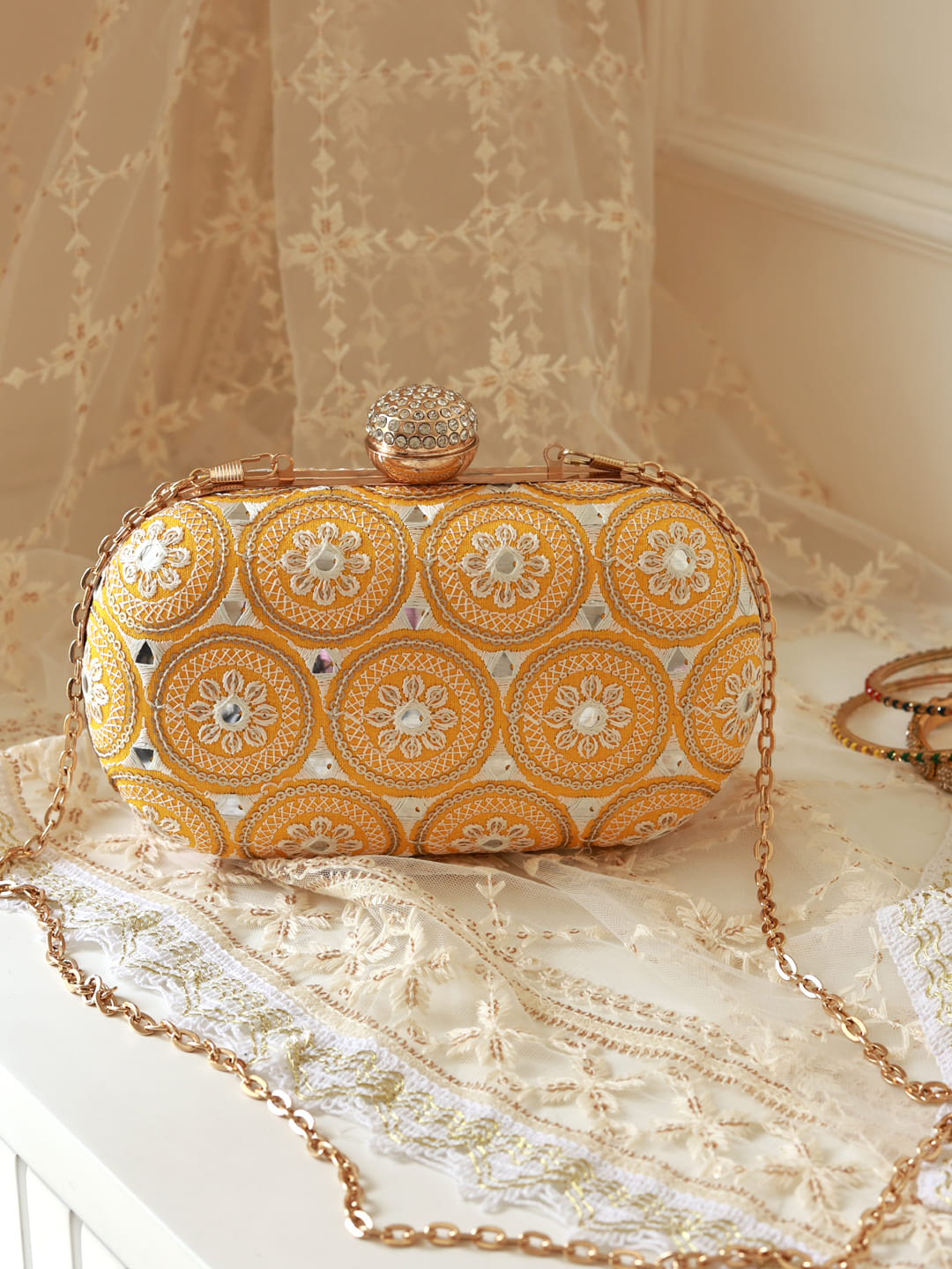 Inaara Yellow Oval Clutch