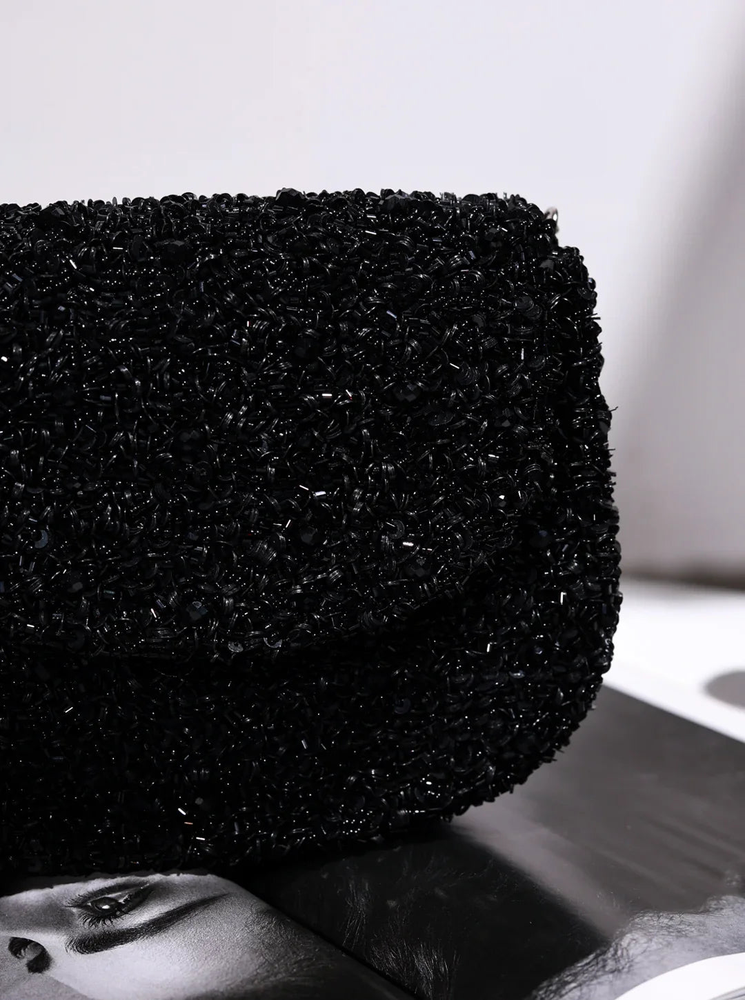 Close-up of a black textured object on a white background