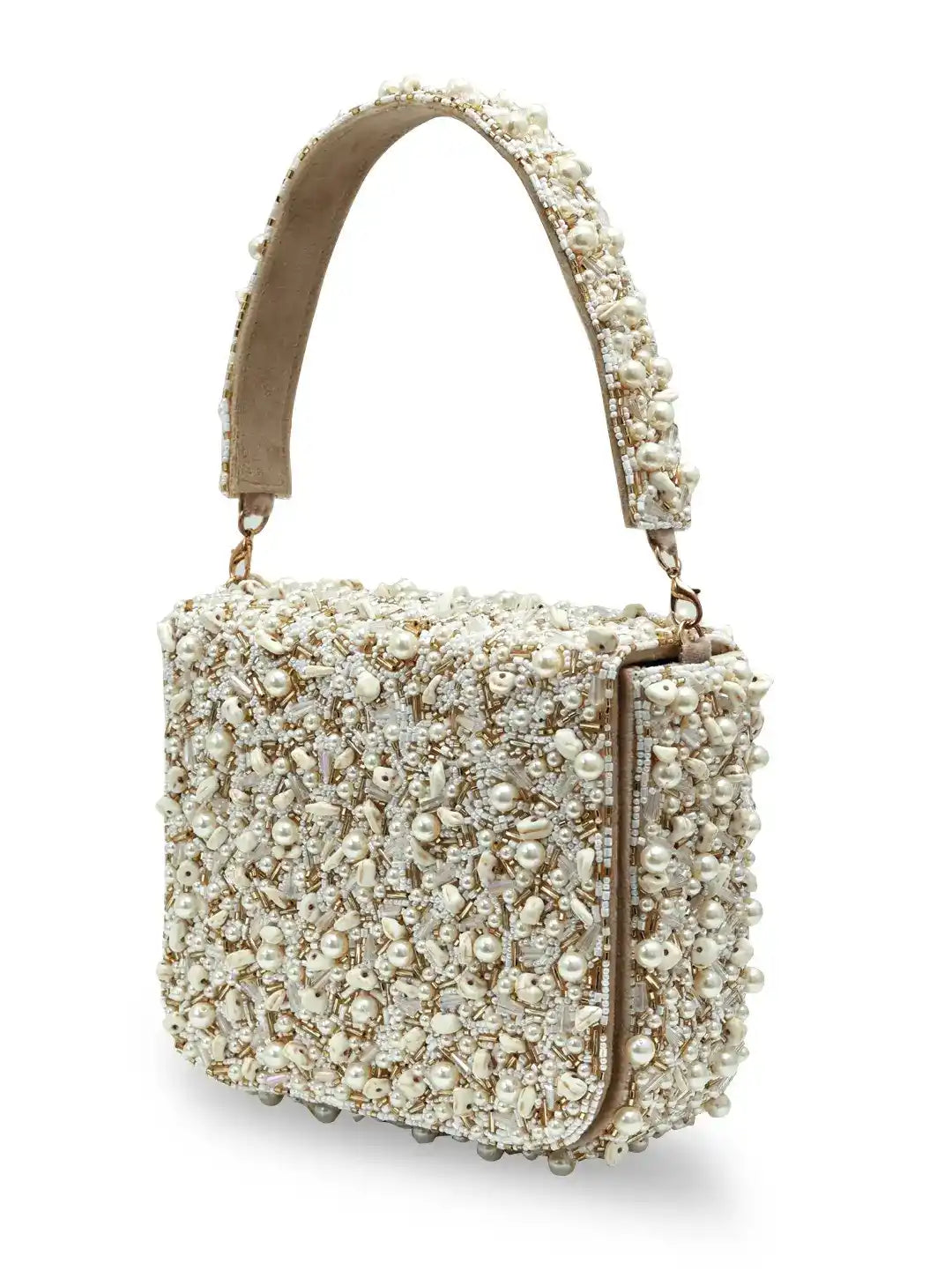 Pearl-handled handbag with intricate detailing on a white background