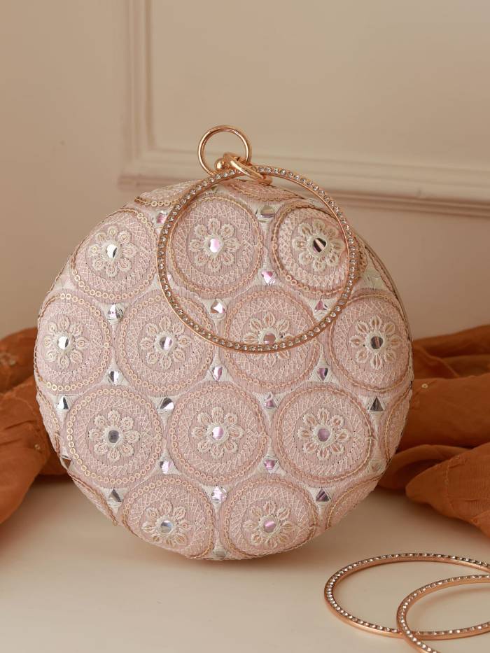 Inaara Peach Round Clutch