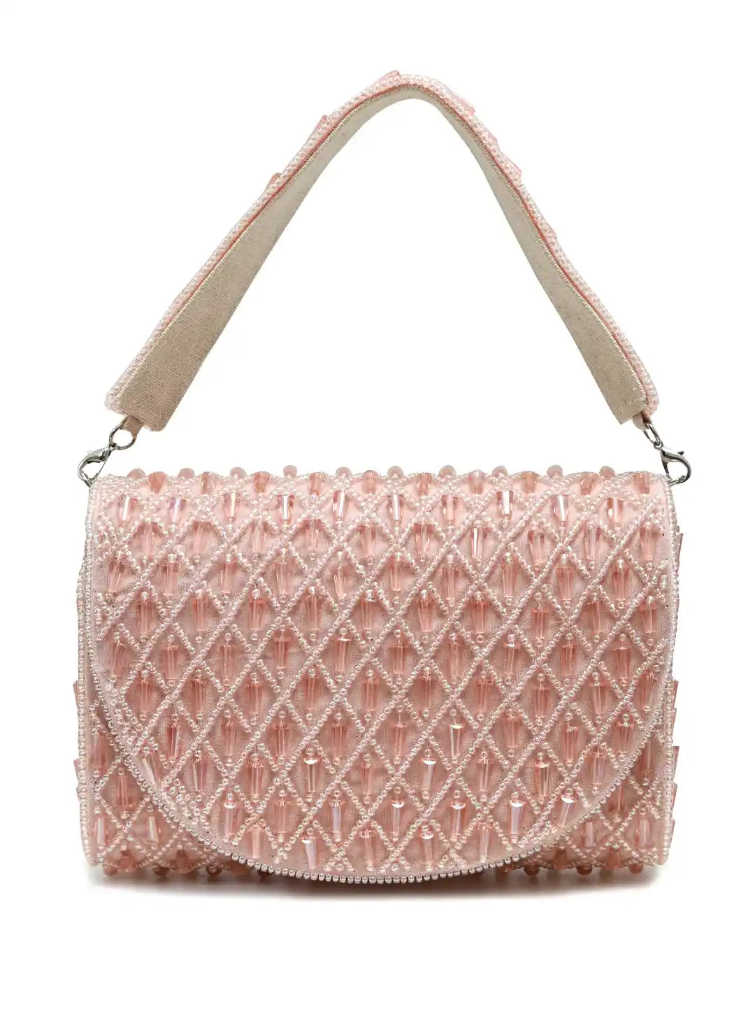 Pink textured handbag with a beige strap on a white background