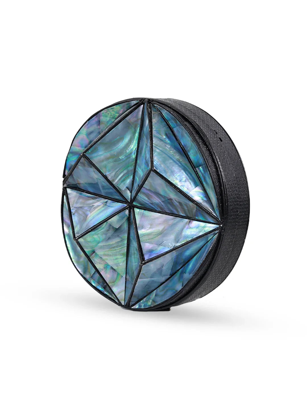 Geometrically patterned round object on a white background