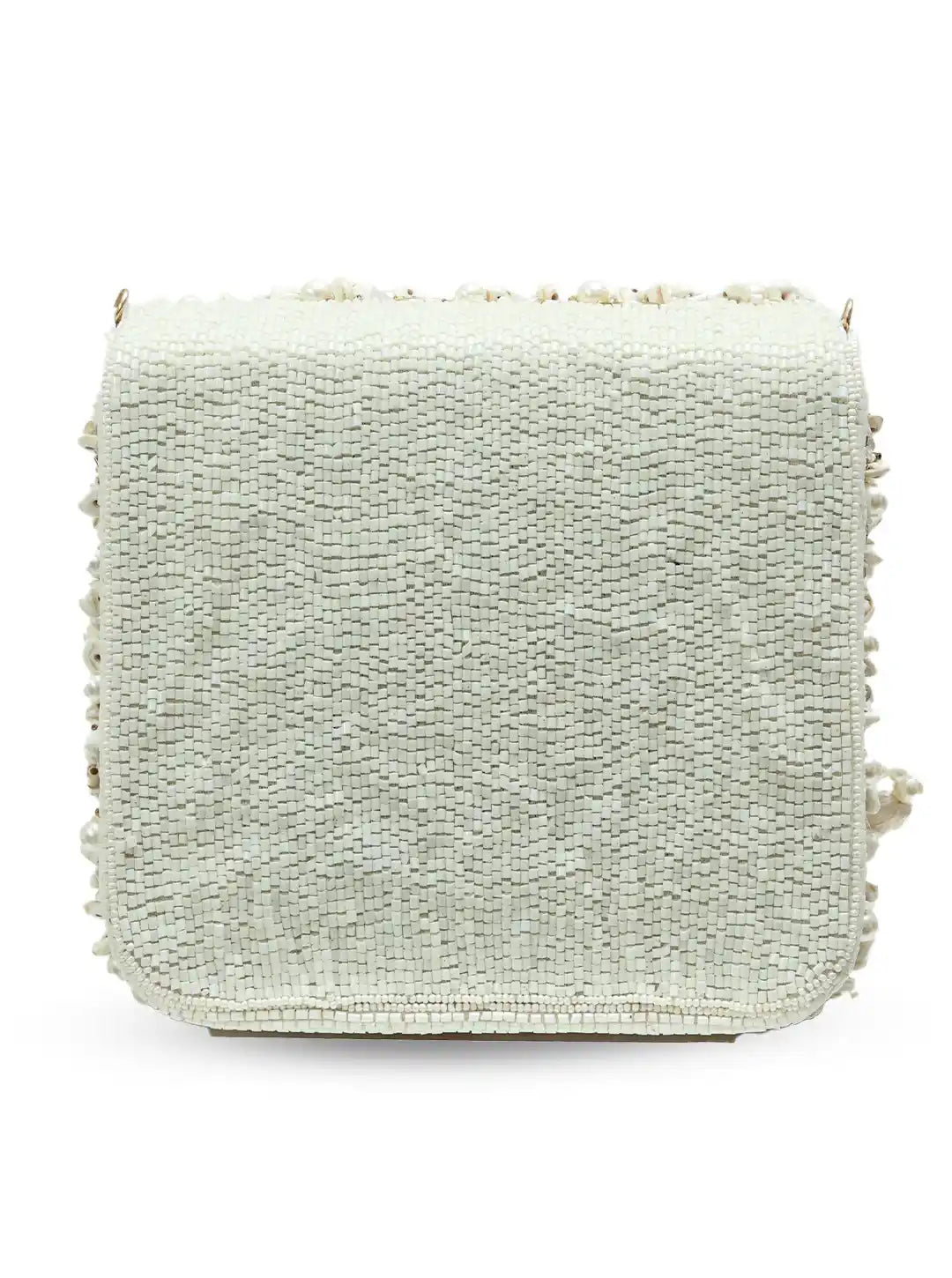 Light green textured clutch bag with decorative elements on a white background
