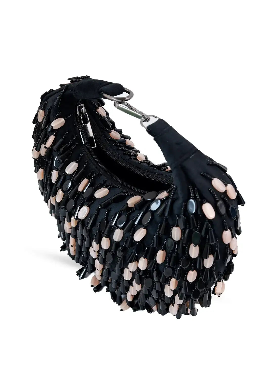 Black handbag with decorative elements on a white background