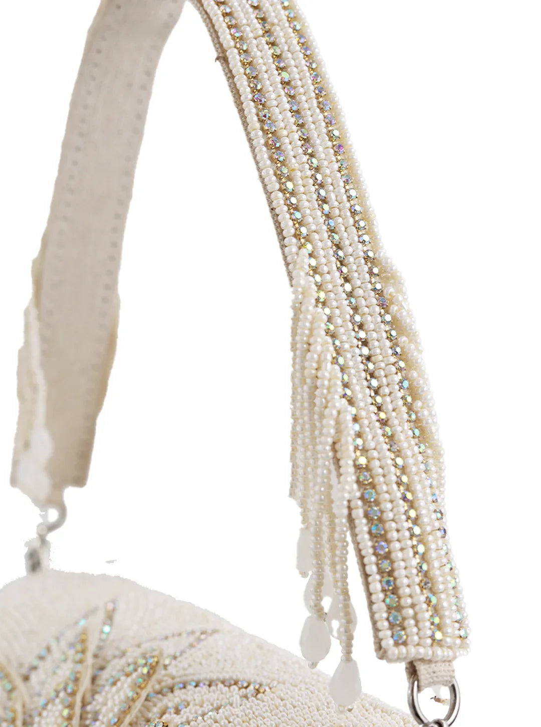 Close-up of a beaded handbag strap with a white background