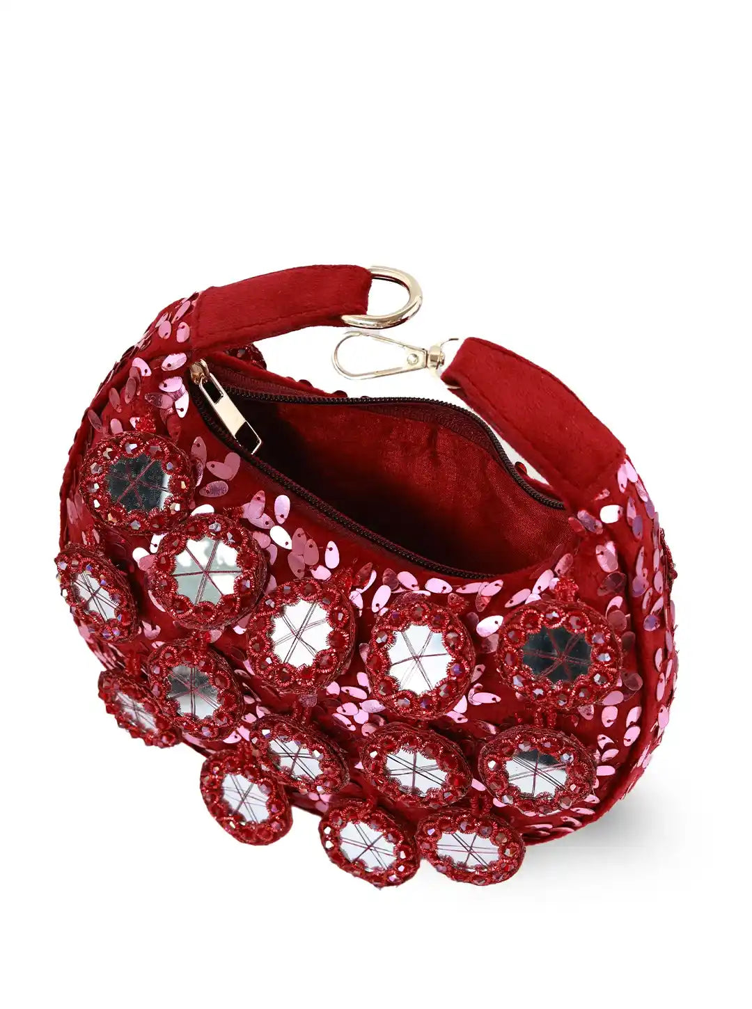 Red handbag with floral embellishments on a white background