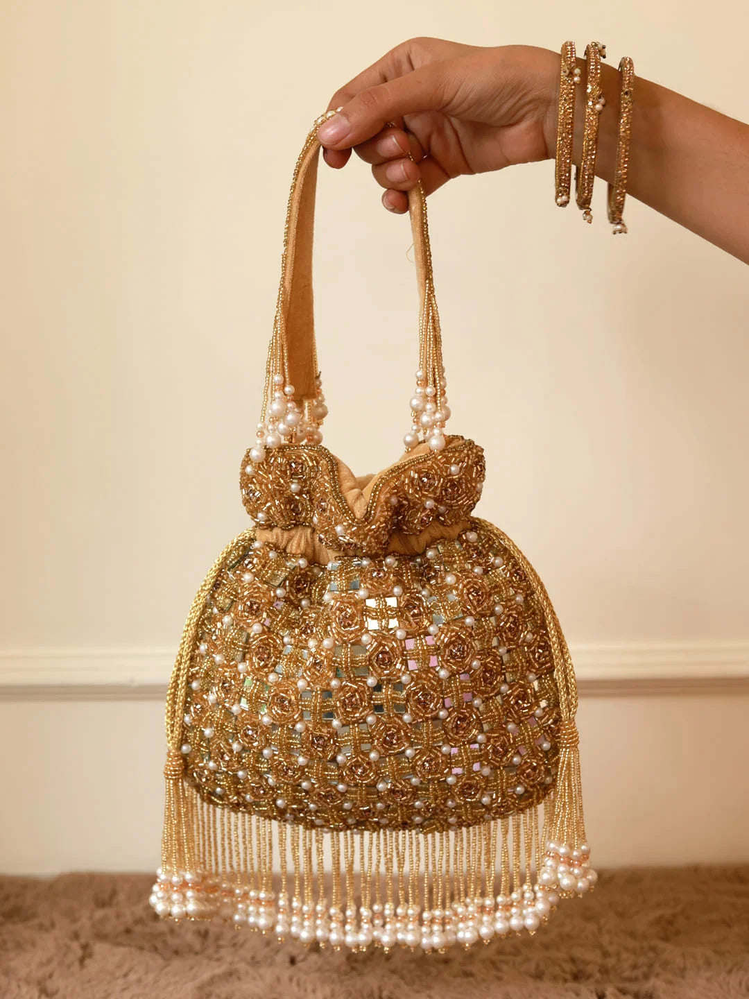 Sehaj Golden Tasselled Potli Bag