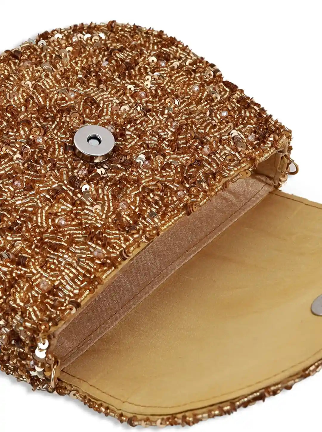 Gold beaded clutch bag on a white background