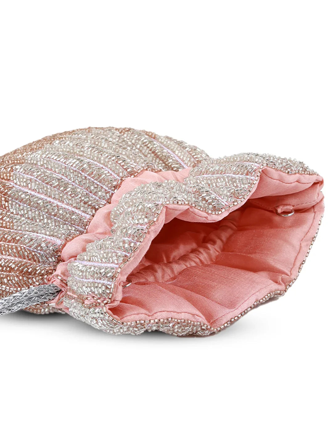 Pink handbag with decorative trim on a white background