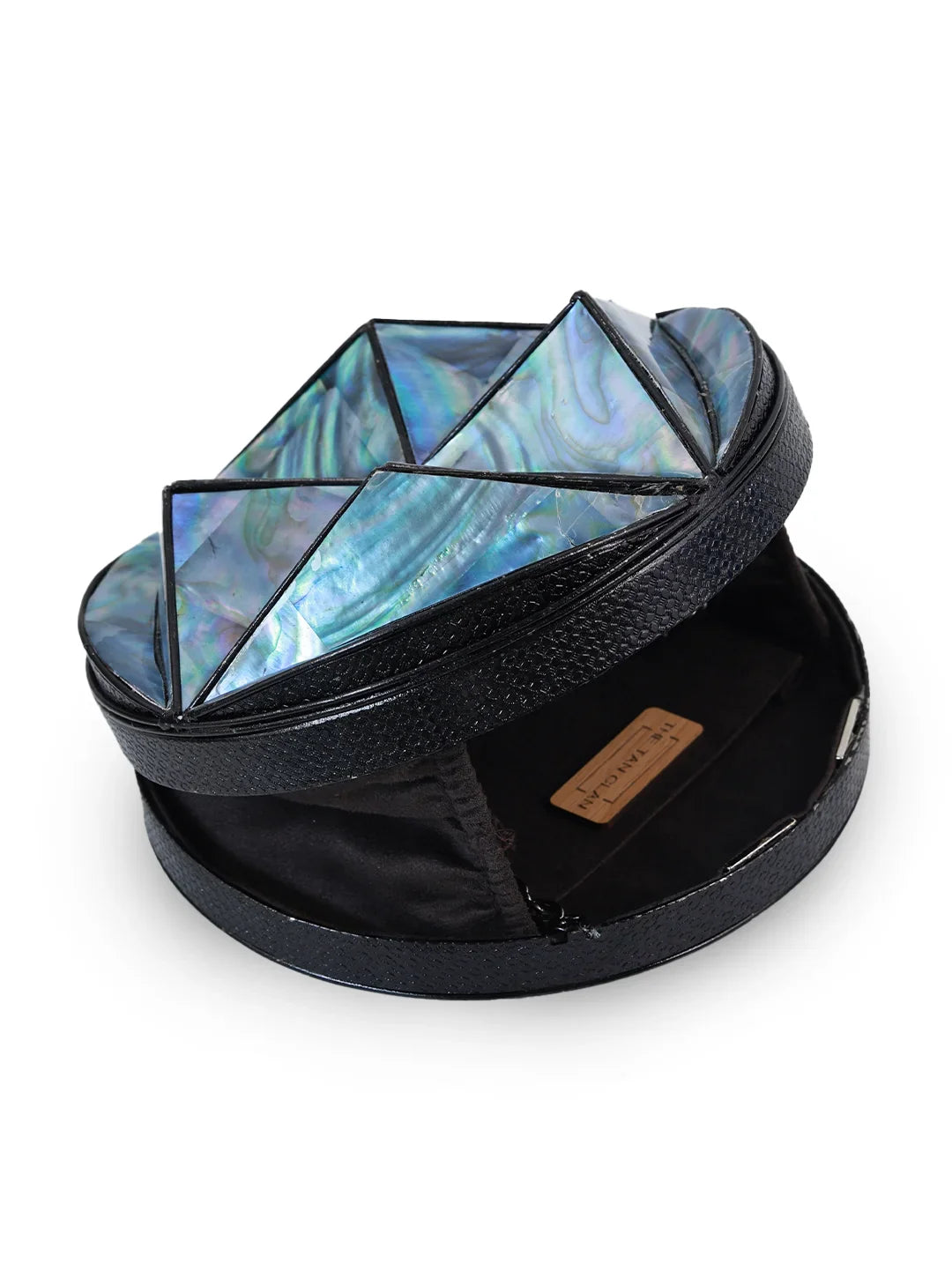 Black jewelry box with geometric abalone shell design on a white background