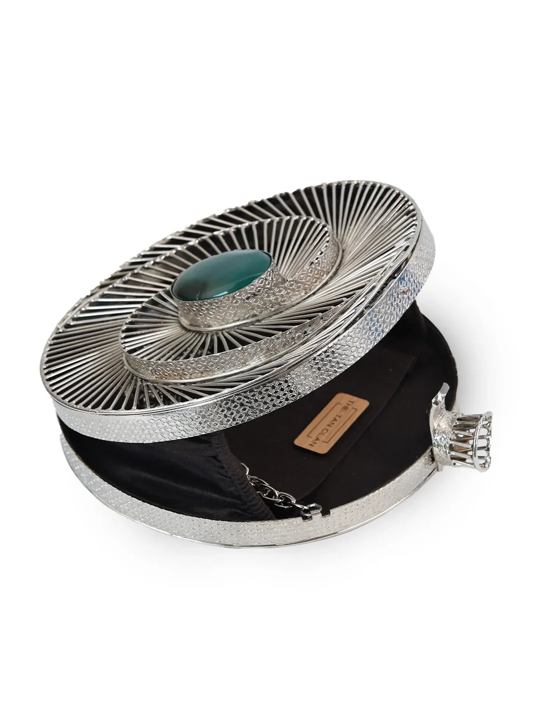 Silver and black decorative box with a textured lid on a white background