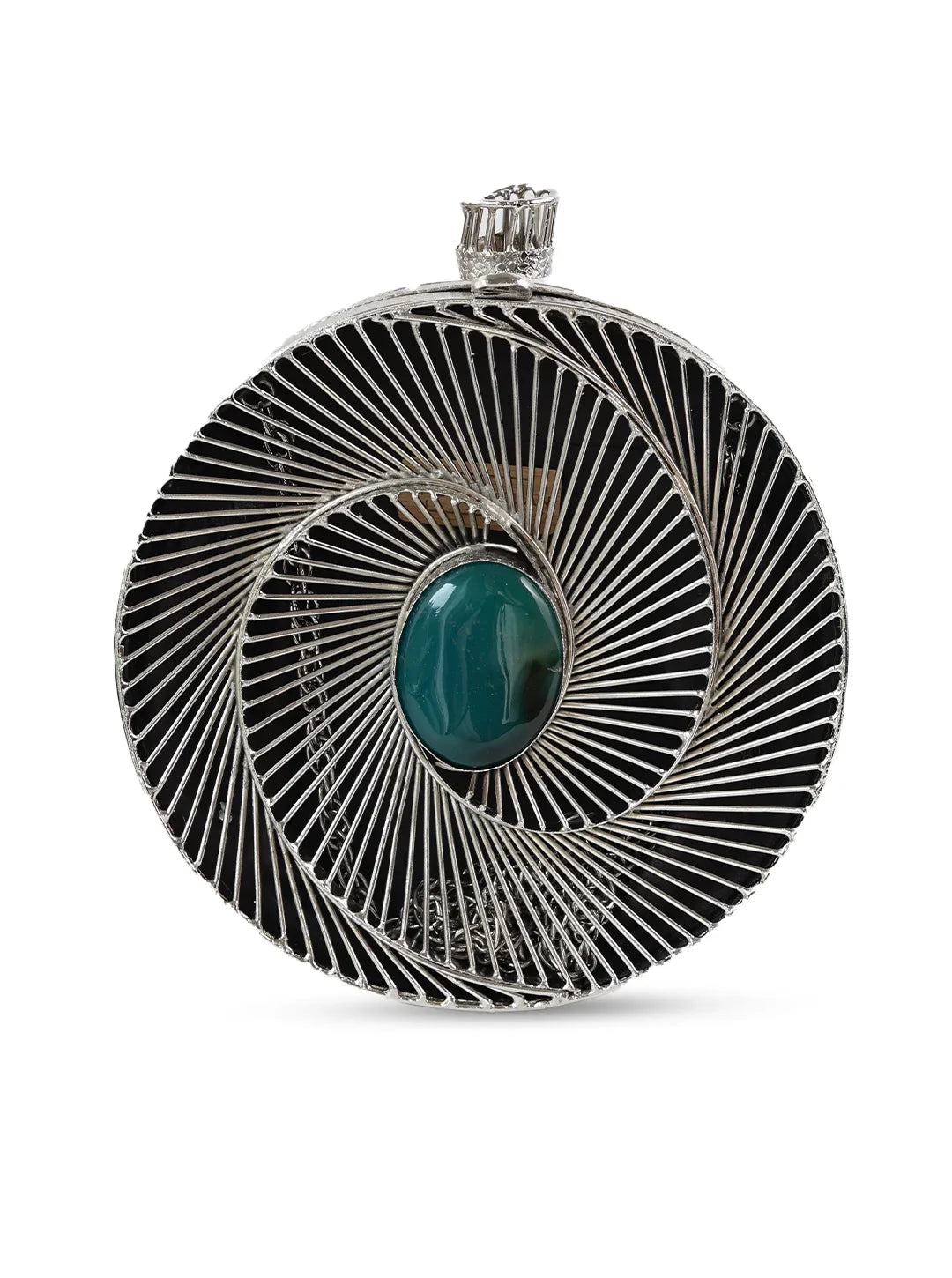 Decorative circular object with intricate design and central green gemstone on a white background