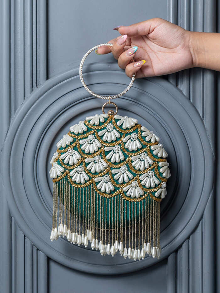 Irsa Round Hand Embroidered Clutch with Tassles