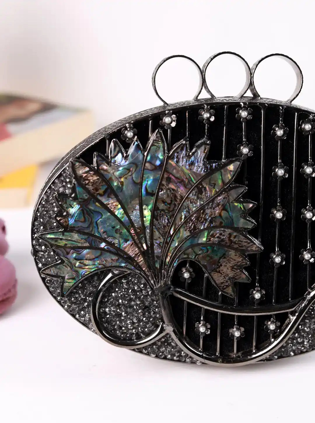 Decorative clutch with floral design and black base