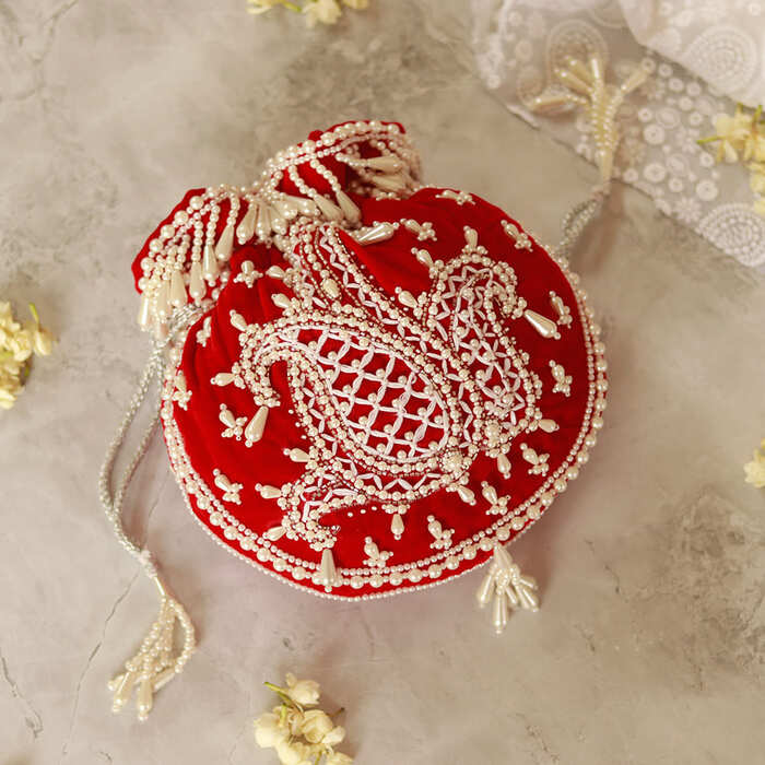 Sukoon Hand Embroidered Potli with Pearl Handle