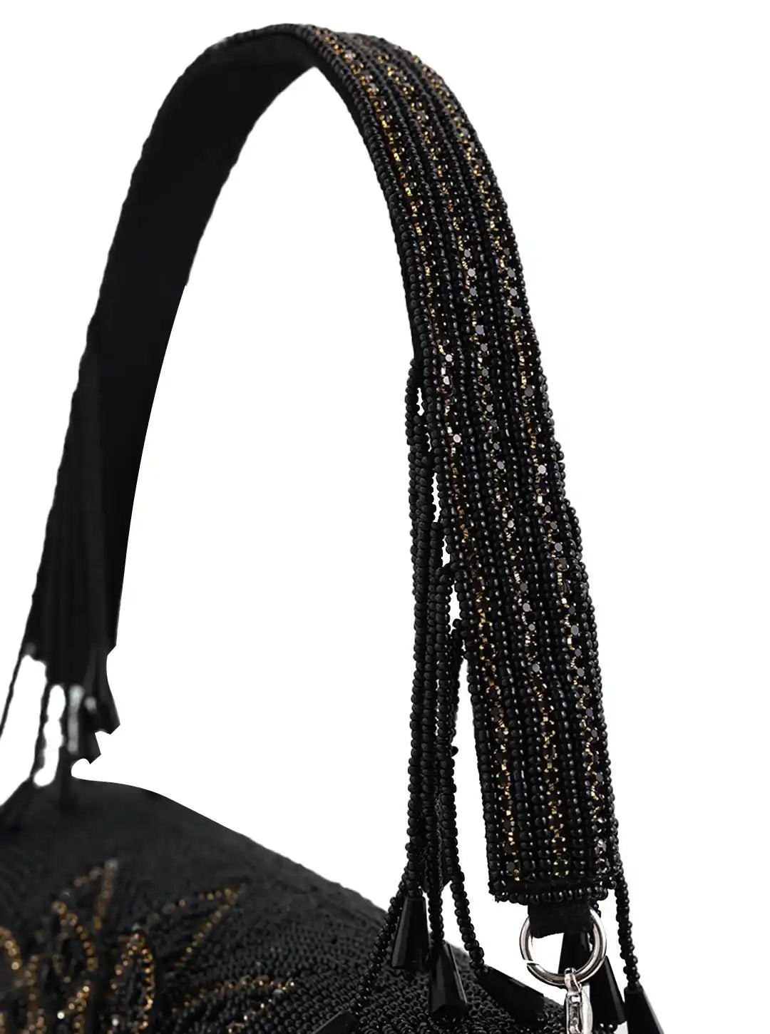Black beaded handbag strap on a white background