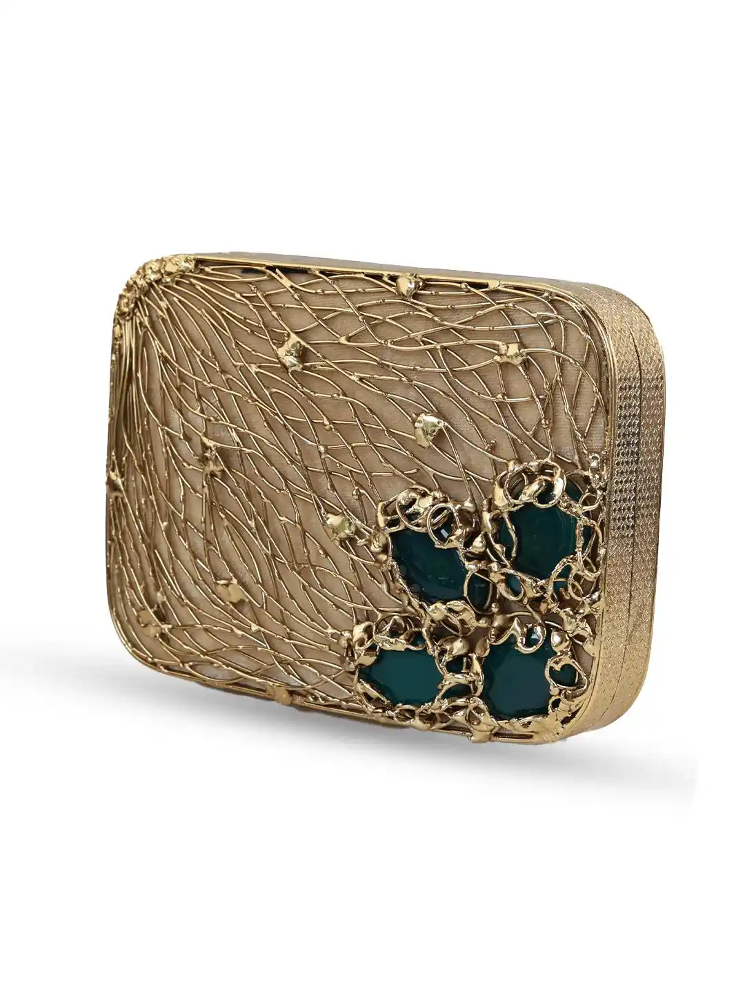 Gold clutch with intricate design on a white background