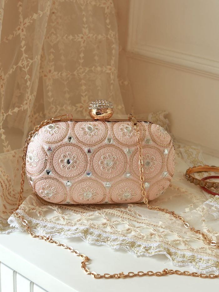 Inaara White Oval Clutch