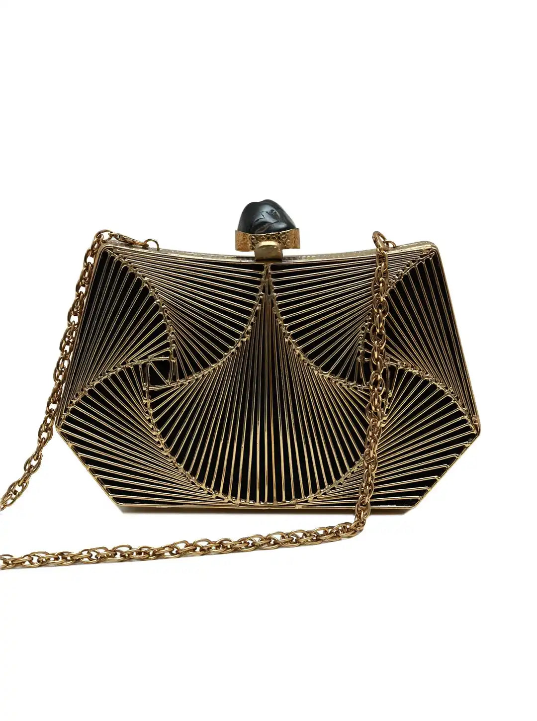 Gold and black handbag with chain strap on a white background