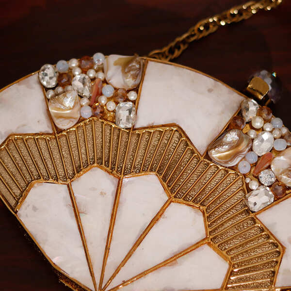 Pankh Golden Brass Mother of Pearl Clutch