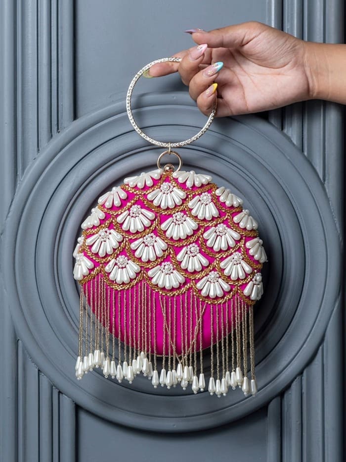 Irsa Round Hand Embroidered Clutch with Tassles