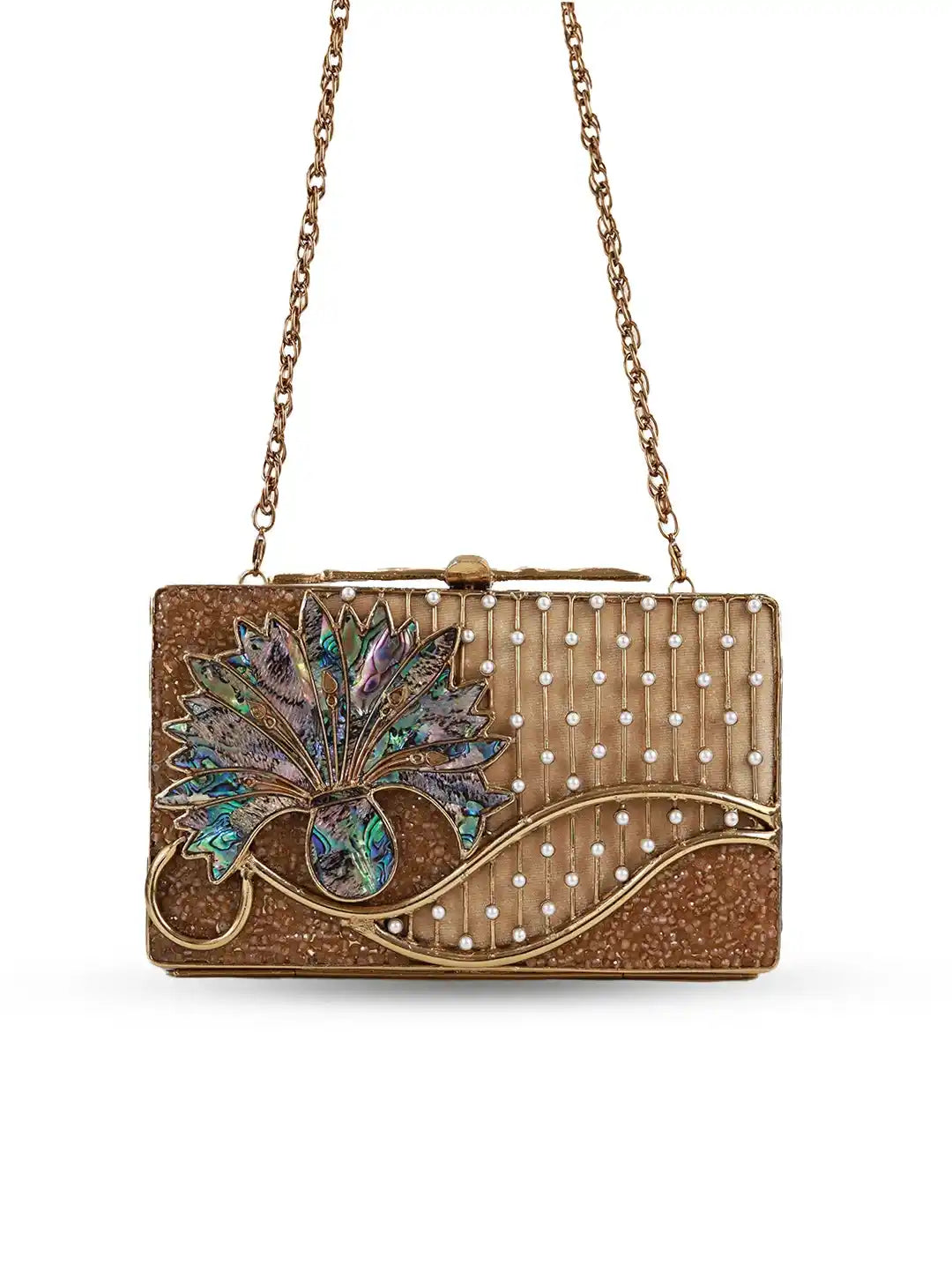 Gold clutch bag with floral design and chain strap on a white background