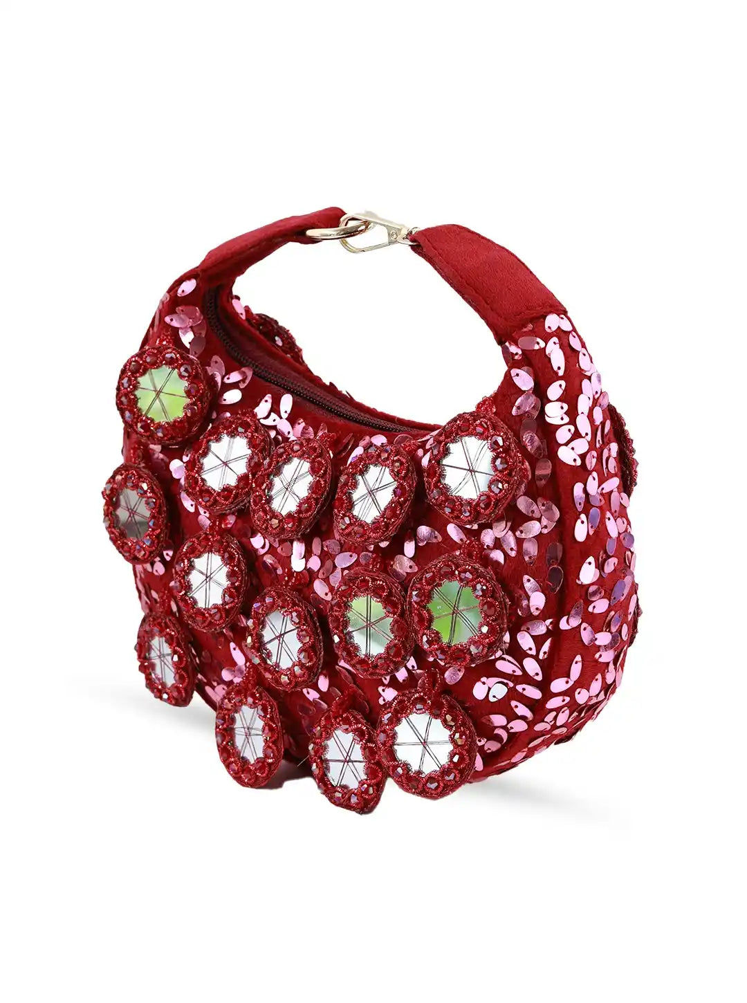 Red handbag with floral embellishments on a white background