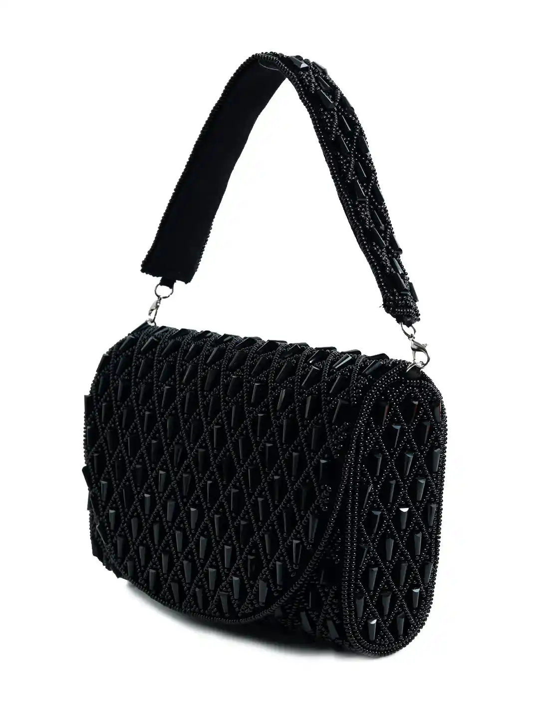 Black quilted handbag with a chain strap on a white background