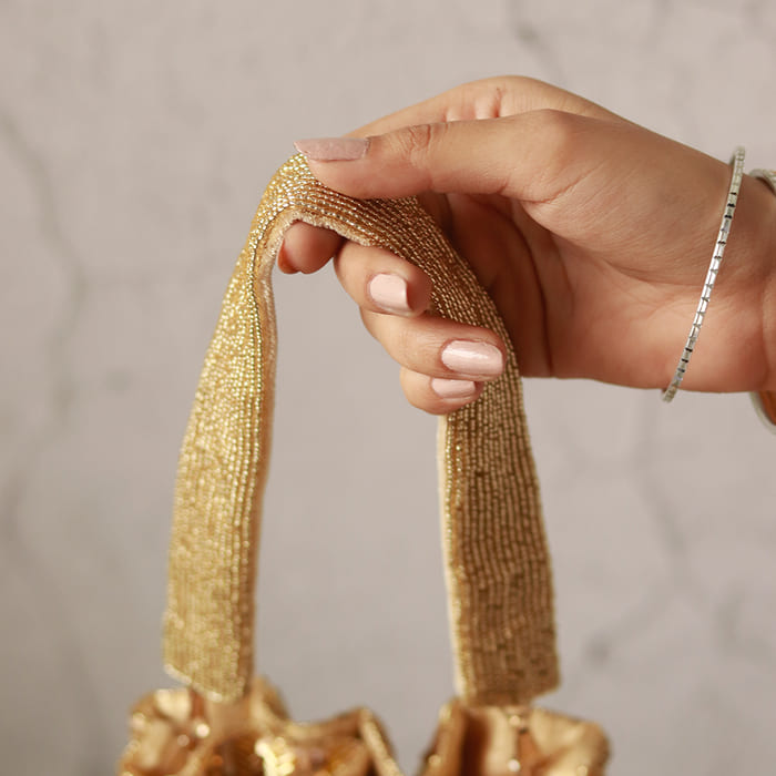 THE TAN CLAN Twinkle Heavy Tassles Potli with Handle