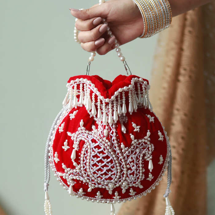 Sukoon Hand Embroidered Potli with Pearl Handle