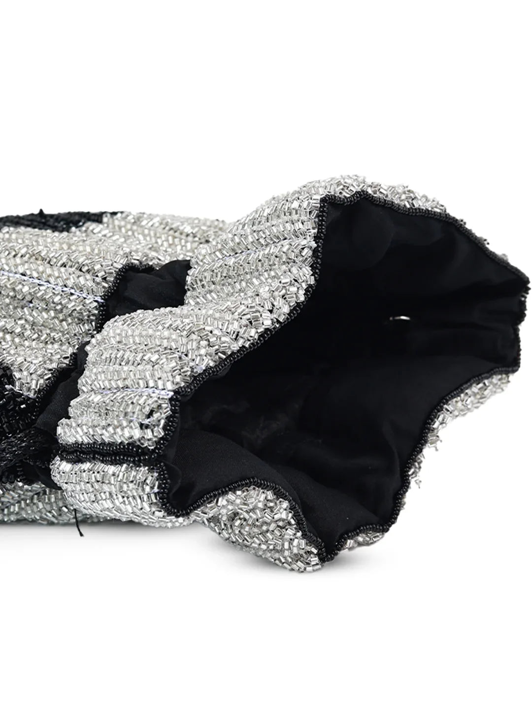 Black and silver beaded clutch bag on a white background