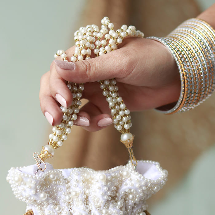 Nayaab Pearl Potli Bag with Handle