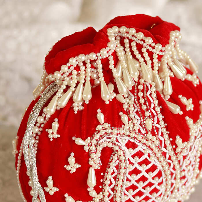 Sukoon Hand Embroidered Potli with Pearl Handle