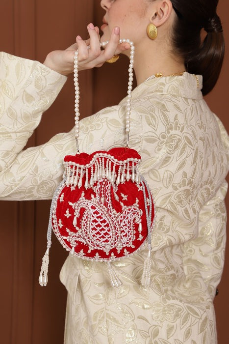 Sukoon Hand Embroidered Potli with Pearl Handle